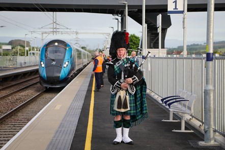 Sandy Mutch, the Border Piper, welcomes in the 6.16am TransPennine Express service to Reston Station, the first passenger service to stop in the village for more than 50 years-2