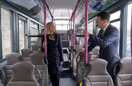 Scottish Minister for Transport, Jenny Gilruth and Scotland MD Duncan Cameron on board the new electric fleet