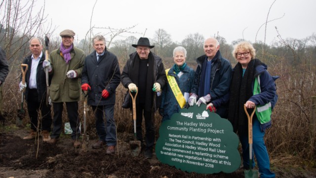 Hadley Wood-4: Hedge laying at Hadley Wood with (L to R) MP Bambos Charalambous, Tree Council chair Joel Cadbury, John Varley, Network Rail chair Lord Hendy of Richmond Hill, Hadley Wood Rail User Group's Francesca Caine, Hadley Wood Association chairman Robert Wilson and Tree Council chief executive Sara Lom.