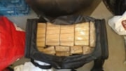 Image of cocaine in black bag: Image of cocaine in black bag
