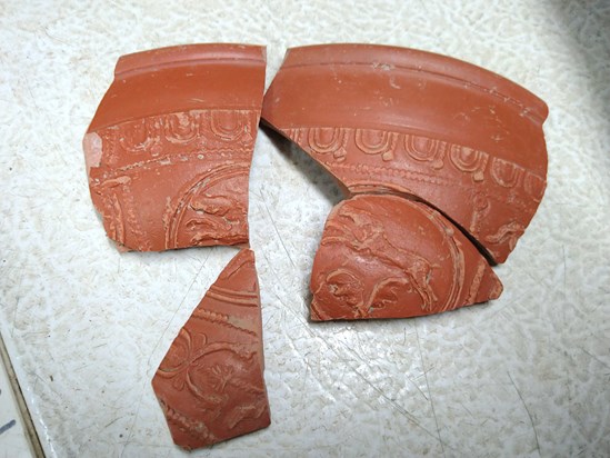 Samian pottery uncovered during archaeological excavations at Fleet Marston, near Aylesbury, Buckinghamshire.: Samian pottery uncovered during archaeological excavations at Fleet Marston, near Aylesbury, Buckinghamshire. Excavations took place during 2021.

Tags: Archaeology, Heritage, Roman artefacts, History, Excavations