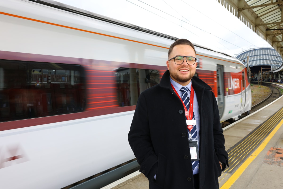 Carter Goodby BEM in front of an LNER Azuma train