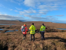Manouk Wilkinson at a peatland restoration site in Shetland