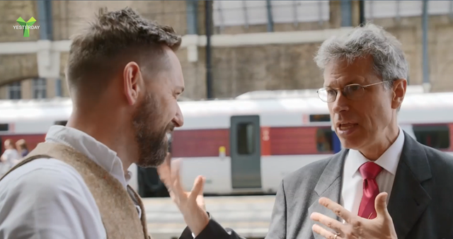 Network Rail's Jon Burden (R) speaks with presenter Tim Dunn (L) for Yesterday's 'The Architecture The Railways Built'
