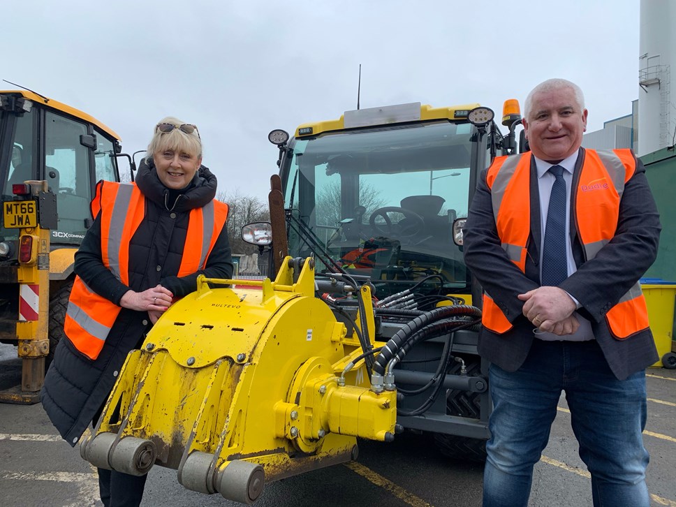 Councillors Shakespeare and Harley take a look at pot hole equipment