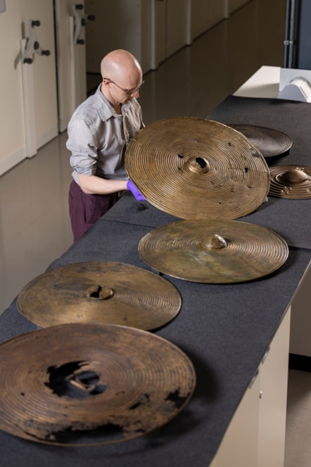 National Museums Scotland curator Dr Matthew Knight with the Bronze Age shields. Photo © Duncan McGlynn (6)