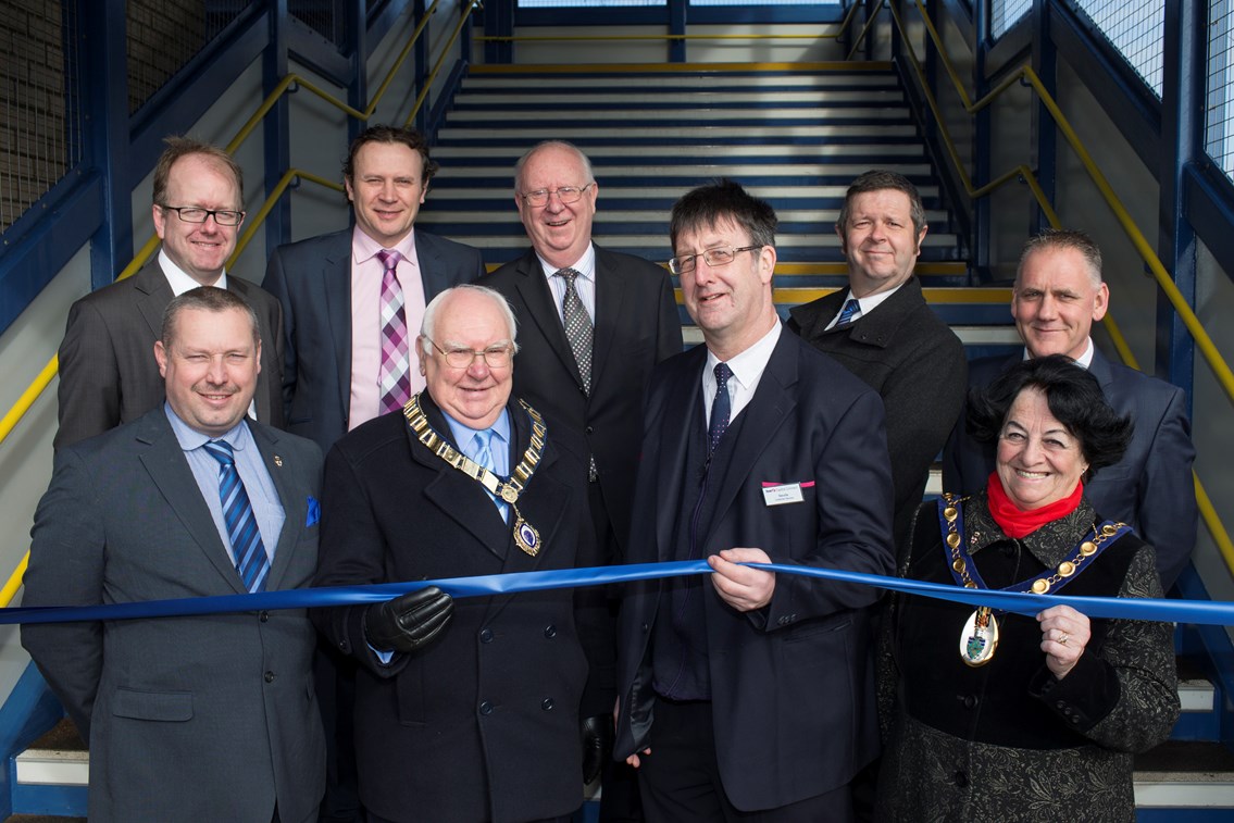 St Neots Footbridge completion event official photo: Neville Cooper (centre), First Capital Connect employee celebrating 38 years on the railway with representatives from developers Gallaghers UK, Huntingdonshire District Council, Cambridgeshire County Council, First Capital Connect and St Neots Town Council.