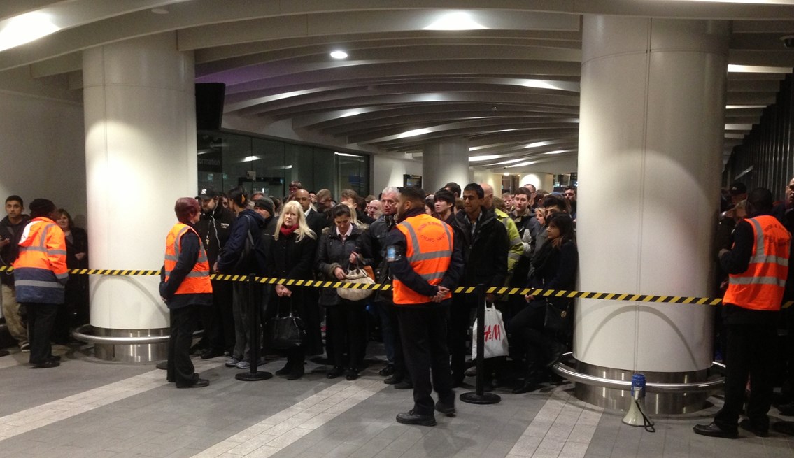 Crowd control measures in place at Birmingham New Street station, December 2013:         