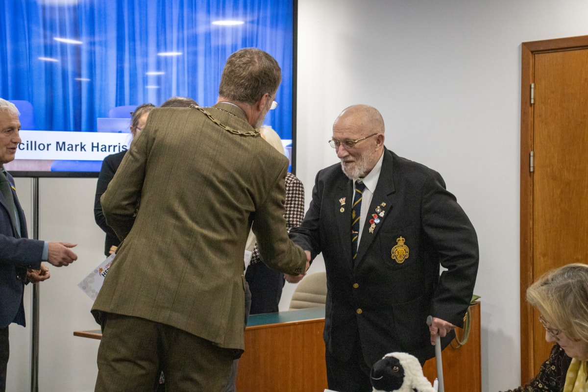 Allen Howe receiving his certificate