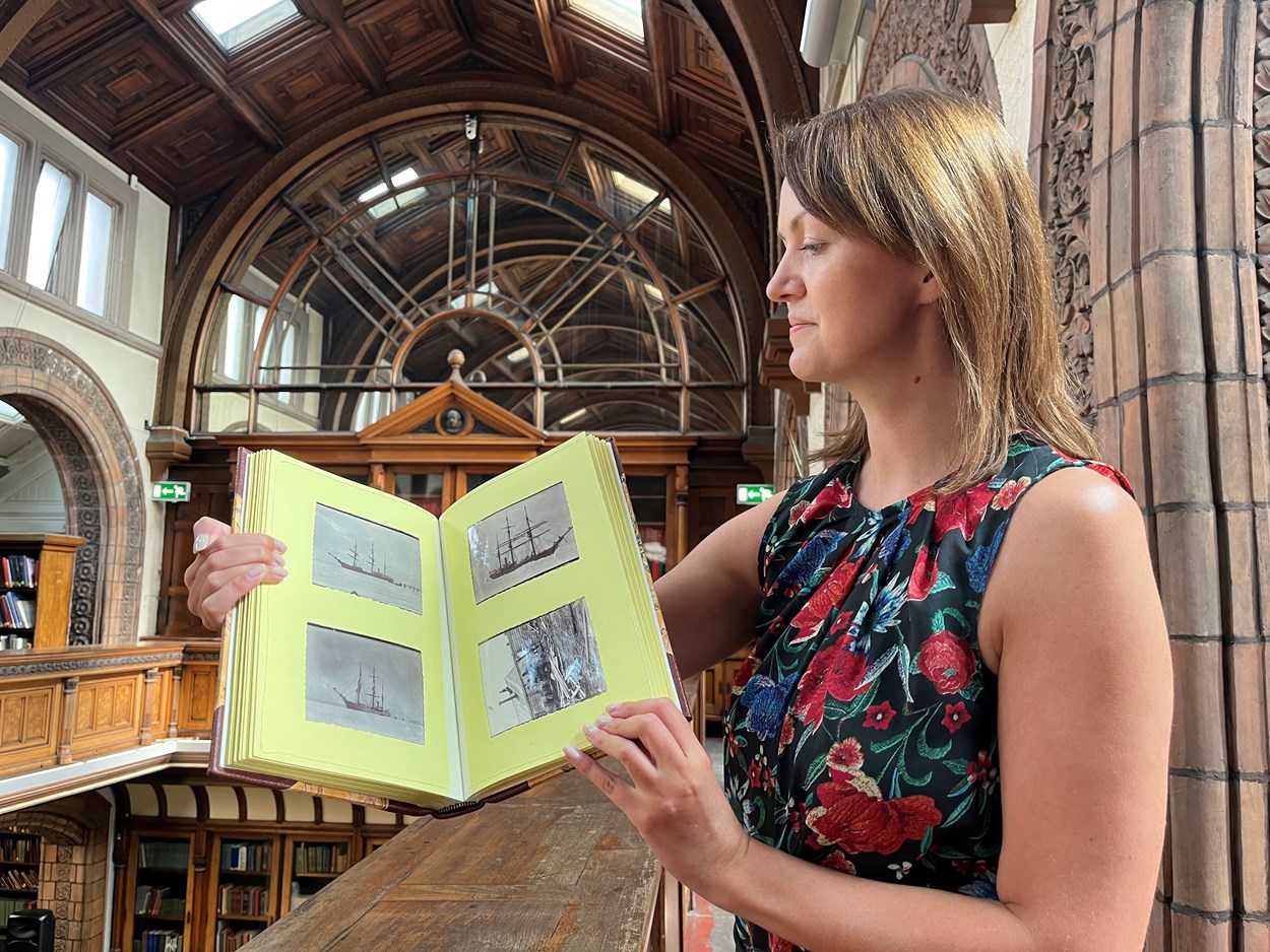 Antarctic photo album: During routine cataloguing in Leeds Central Library’s strongroom, special collections librarian Rhian Isaac (pictured) found what appeared to be an unassuming family photo album tucked away on a shelf.
Despite its somewhat drab 1990s binding, inside she found an enthralling series of images documenting the mission of The Morning, a relief ship to Captain Robert Falcon Scott’s first expedition to the Antarctic between 1901-4.