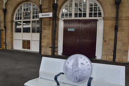Image shows 10p promo coin at Sheffield station