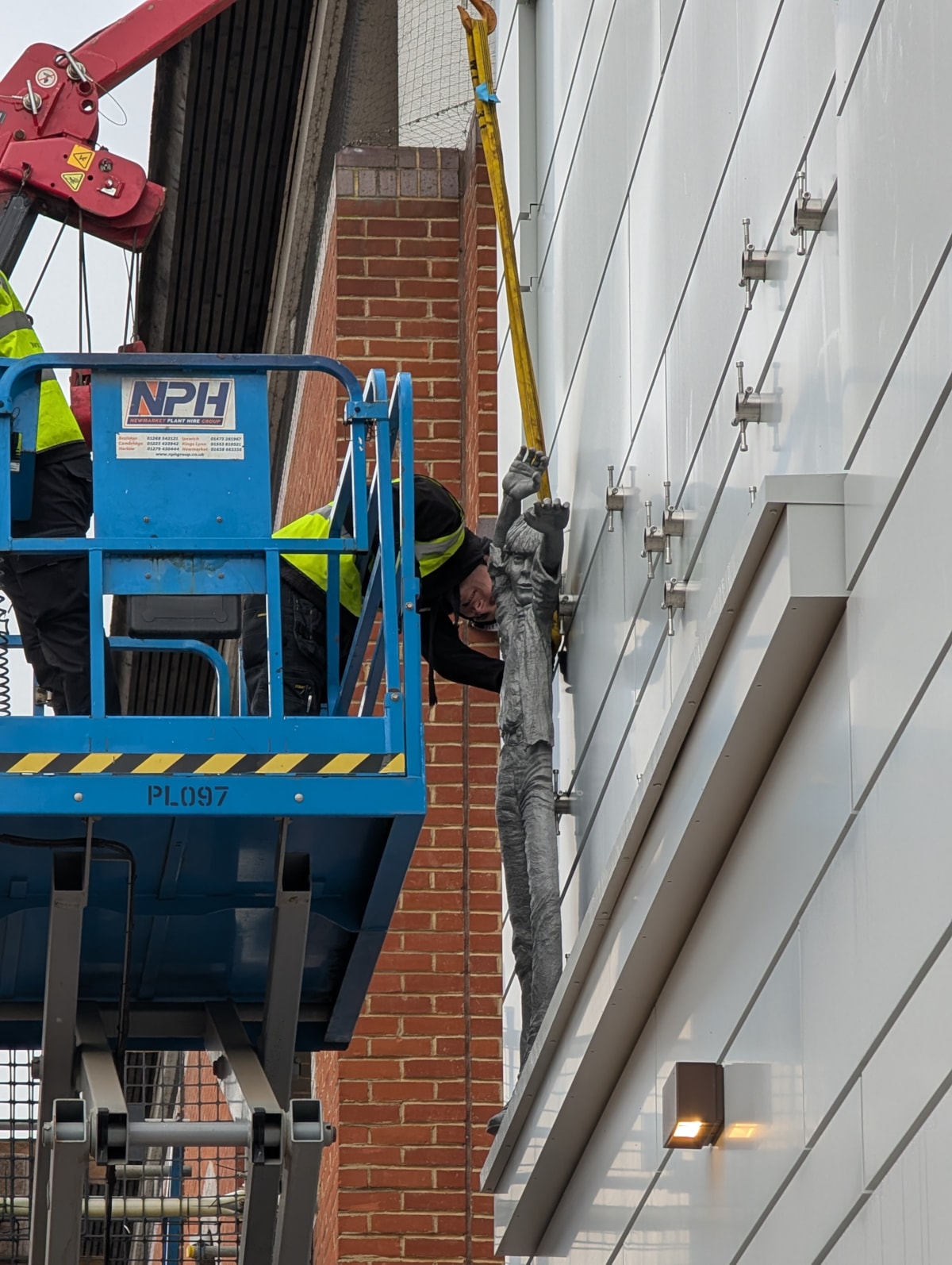 Close up of installation of first figure