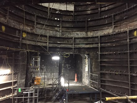The bottom of the vent shaft during construction, with the familiar white tiles still visible. (Copyright TfL)