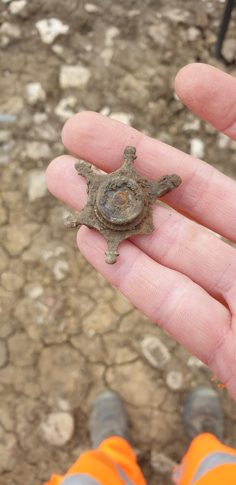 Roman brooch uncovered during archaeological excavations at Fleet Marston, near Aylesbury, Buckinghamshire.: Roman brooch uncovered during archaeological excavations at Fleet Marston, near Aylesbury, Buckinghamshire. Excavations took place during 2021.

Tags: Archaeology, Heritage, Roman artefacts, History, Excavations