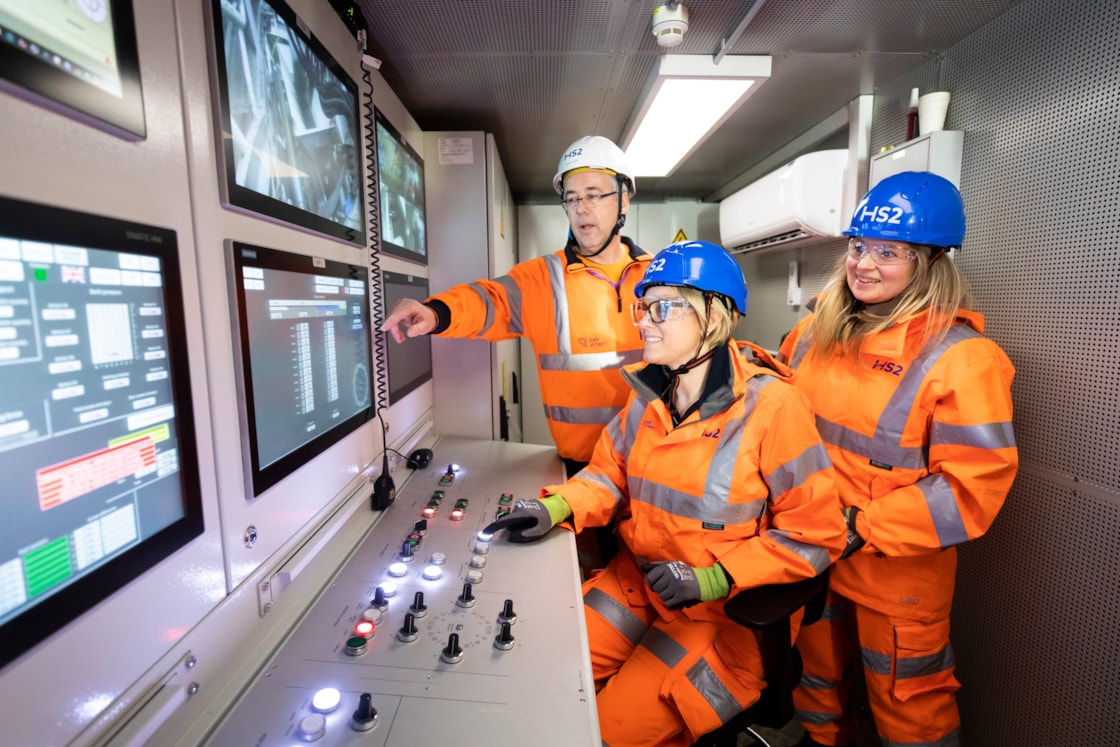 Train driver steers TBM Karen towards Euston: L-R: Michael Wilson, TBM driver; Vicky Knight, train driver; HayleyRichardson, train driver
