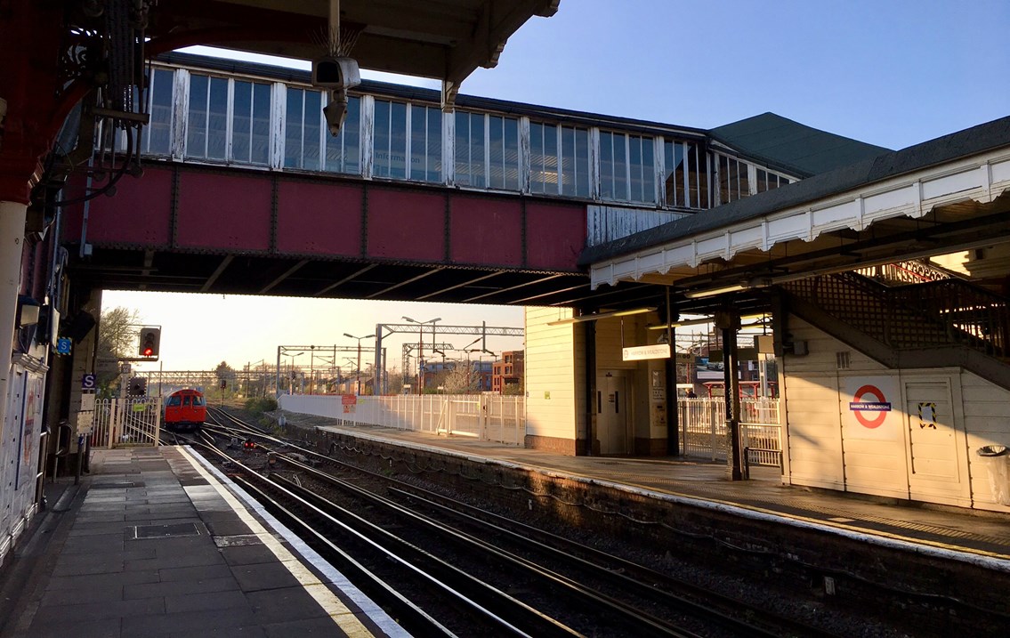 Harrow and Wealdstone station footbridge at dusk May 2019