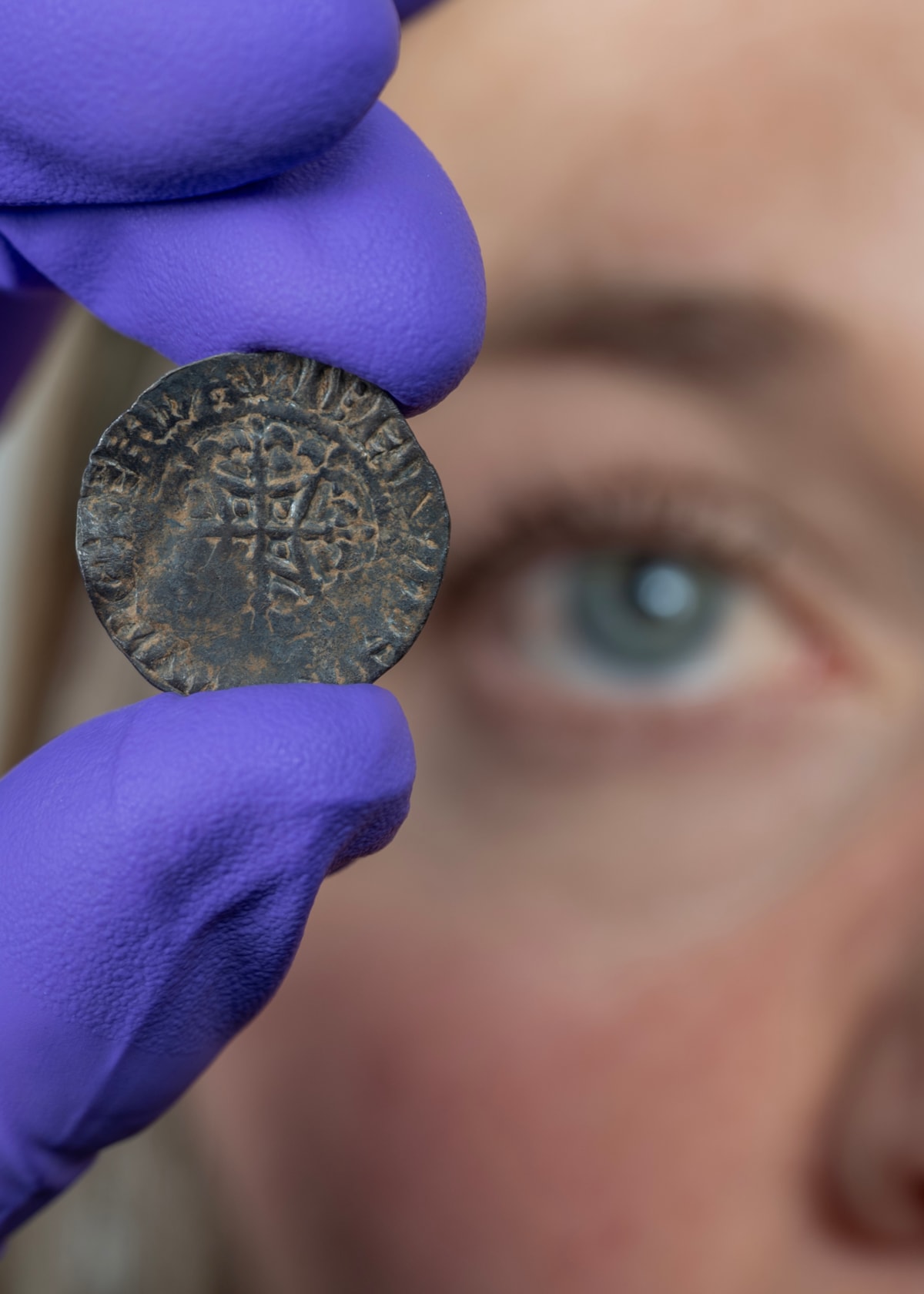 Curator Alice Blackwell inspects the David I penny. Image © Neil Hanna (1)