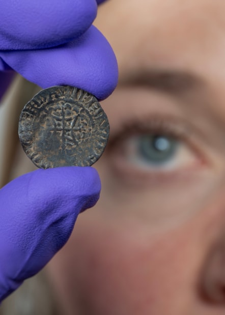 Curator Alice Blackwell inspects the David I penny. Image © Neil Hanna (1)