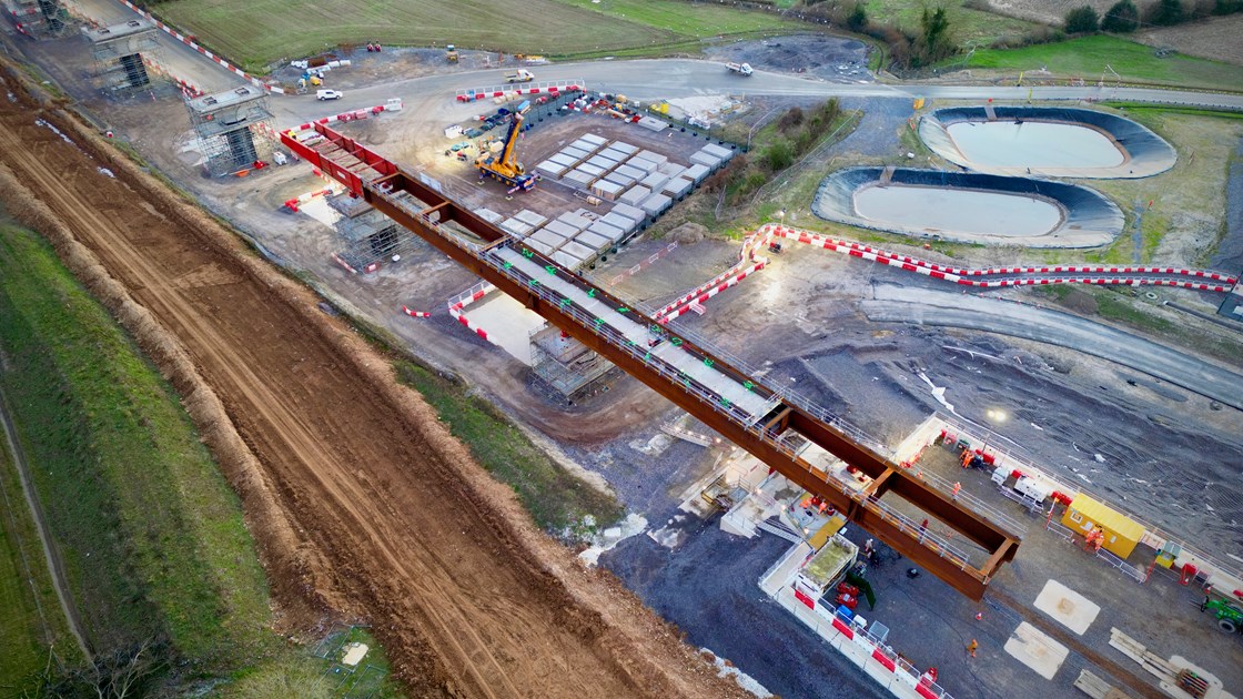 Wendover Dean deck beam slid into position with deck slabs and balancing ponds behind 11.01.24
