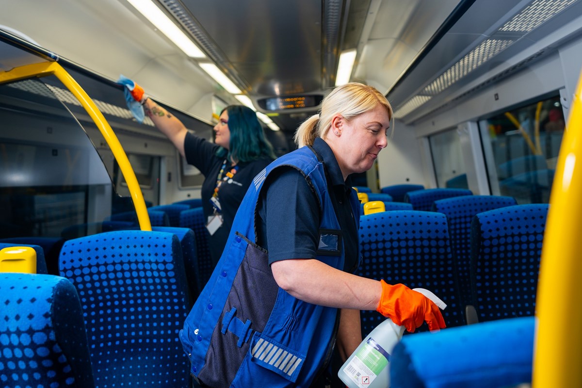 Image shows Train Presentation Operatives on-board a Northern train