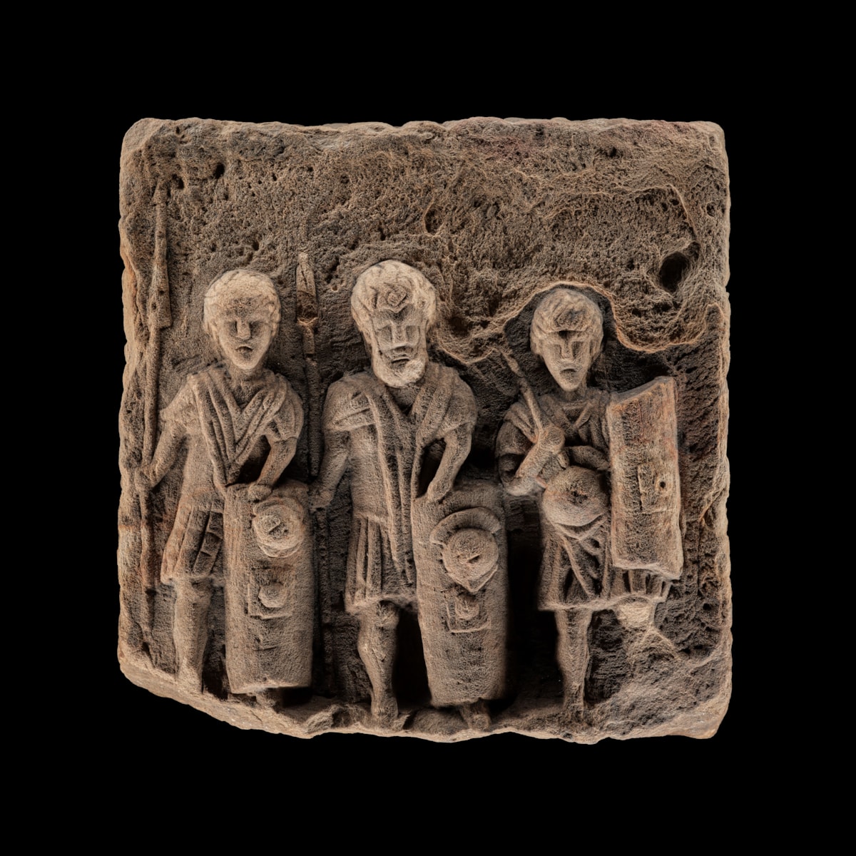 Sandstone sculpture of three legionaries, Croy Hill, 200 - 300 AD. Image © National Museums Scotland