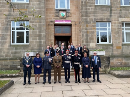 Moray Councillors, military personnel and LLs on steps of Moray Council HQ