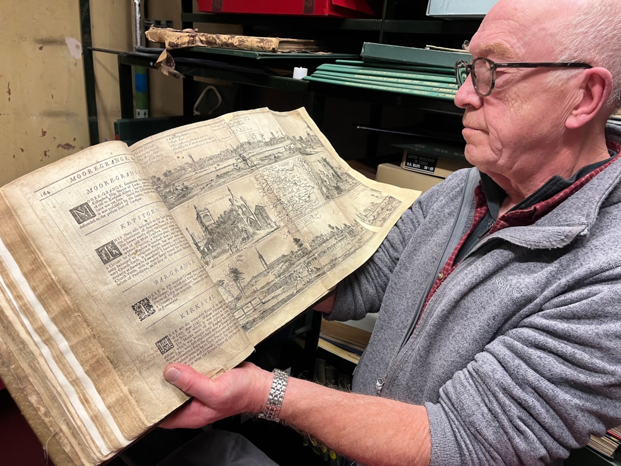 Leeds histories: Library and digital assistant Phil Wilde with Leeds Central Library’s one-of-a-kind edition of famed historian Ralph Thoresby’s Ducatus Leodiensis.
Printed in the mid-1740s, the incredible book will be on display at the library until the New Year.