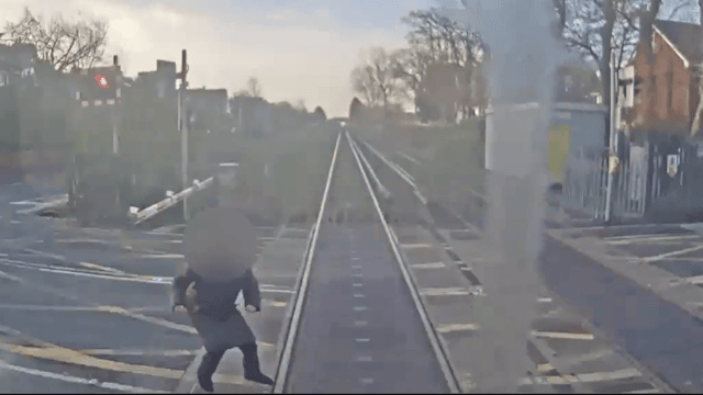 Footage released showing near miss at level crossing in Merseyside: cropped-crescent road near miss