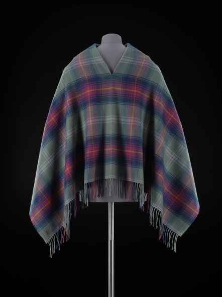 Lambswool poncho in 'Hame' tartan by Lochcarron of Scotland, 2022. The outfit was acquired as part of a contemporary Highland dress collecting project