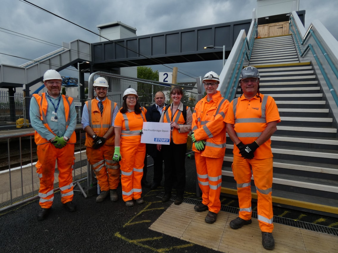 Colleagues from Scotland's Railway inspect Uddingston footbridge before it opens to the public