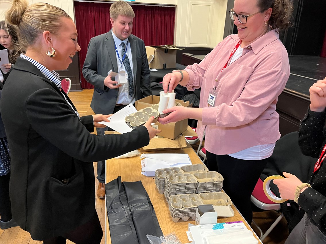 Students at The Mount School purchasing materials to build their bridge, IWD event, Network Rail