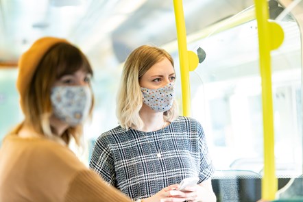 Passengers wearing face coverings on Southern train: Passengers on a Southern rail service (GTR)
