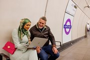 TfL Image -  Customers using a laptop at Bond Street Elizabeth line station: TfL Image -  Customers using a laptop at Bond Street Elizabeth line station