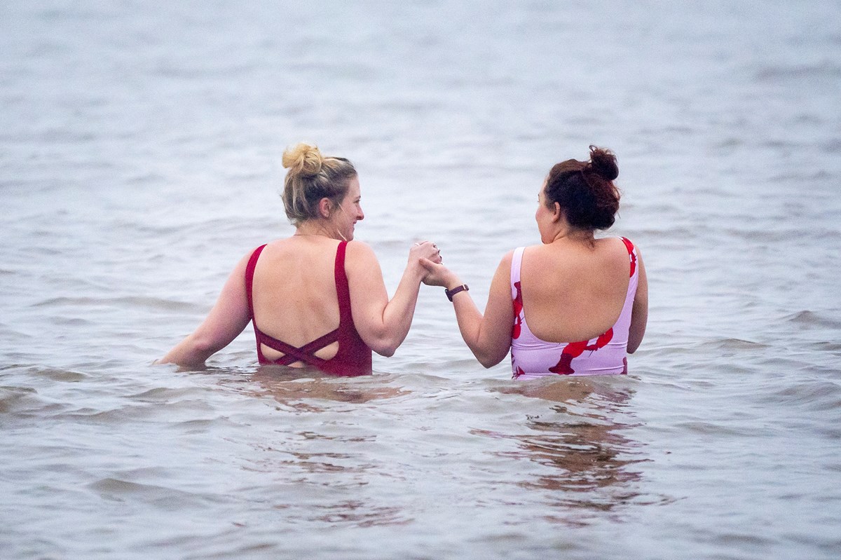 Dawnstalkers who meet every day on Penarth beach for a sunrise sea swim, whatever the weather, welcome in December with a dip. Welsh Government hopes that applications for bathing water status being open to the public will help encourage more cold water swimming groups which has multiple benefits fo