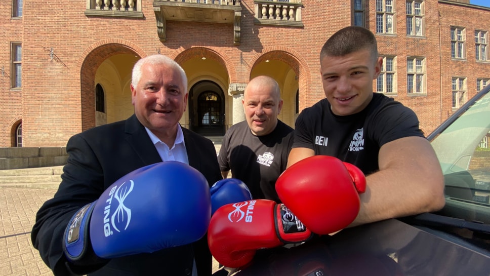 Leader Cllr Pat Harley, Team Pumpking Boxing Club director Carl Collins and local boxer Ben Collins