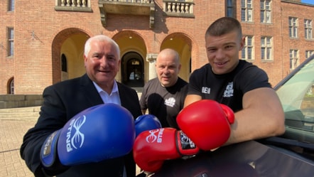 Leader Cllr Pat Harley, Team Pumpking Boxing Club director Carl Collins and local boxer Ben Collins