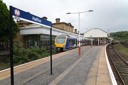 A Northern train stands at Halifax station on the way to Leeds