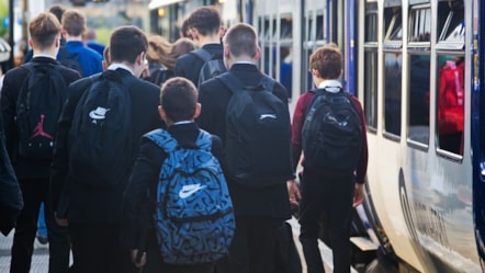 Image shows schoolchildren commuting to school