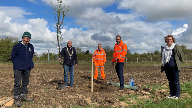 First apple tree being planted: (L-R) Richard Wilson, Chair of Sodbury Woodland and Nature (SWaN); Councillor James Ball, Mayor of Sodbury; Network Rail environment specialist, Mike Franklin; Netweork Rail interim Western route director, Chris Pearce; and Sodbury Town Clerk, Cate Davidson