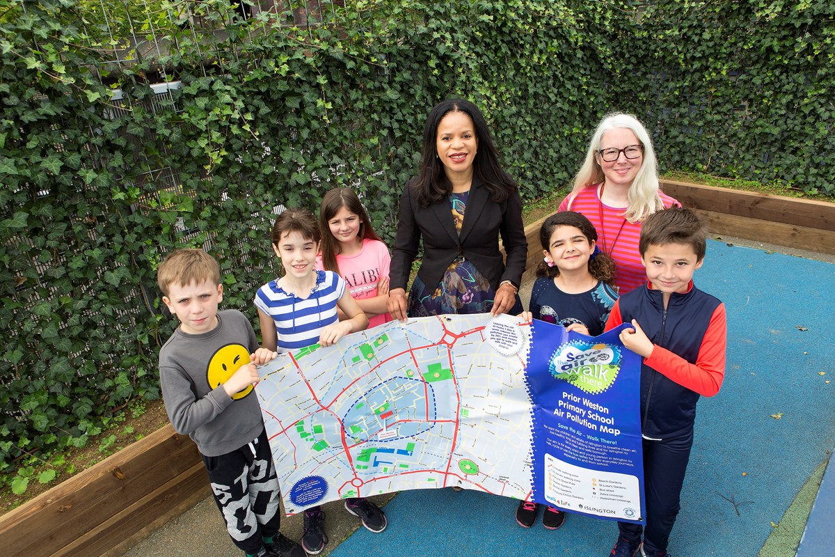 Pupils at Prior Weston School with the new ivy screen and air pollution map, with Cllr Claudia Webbe (centre) and Tamzin Barford (back right)