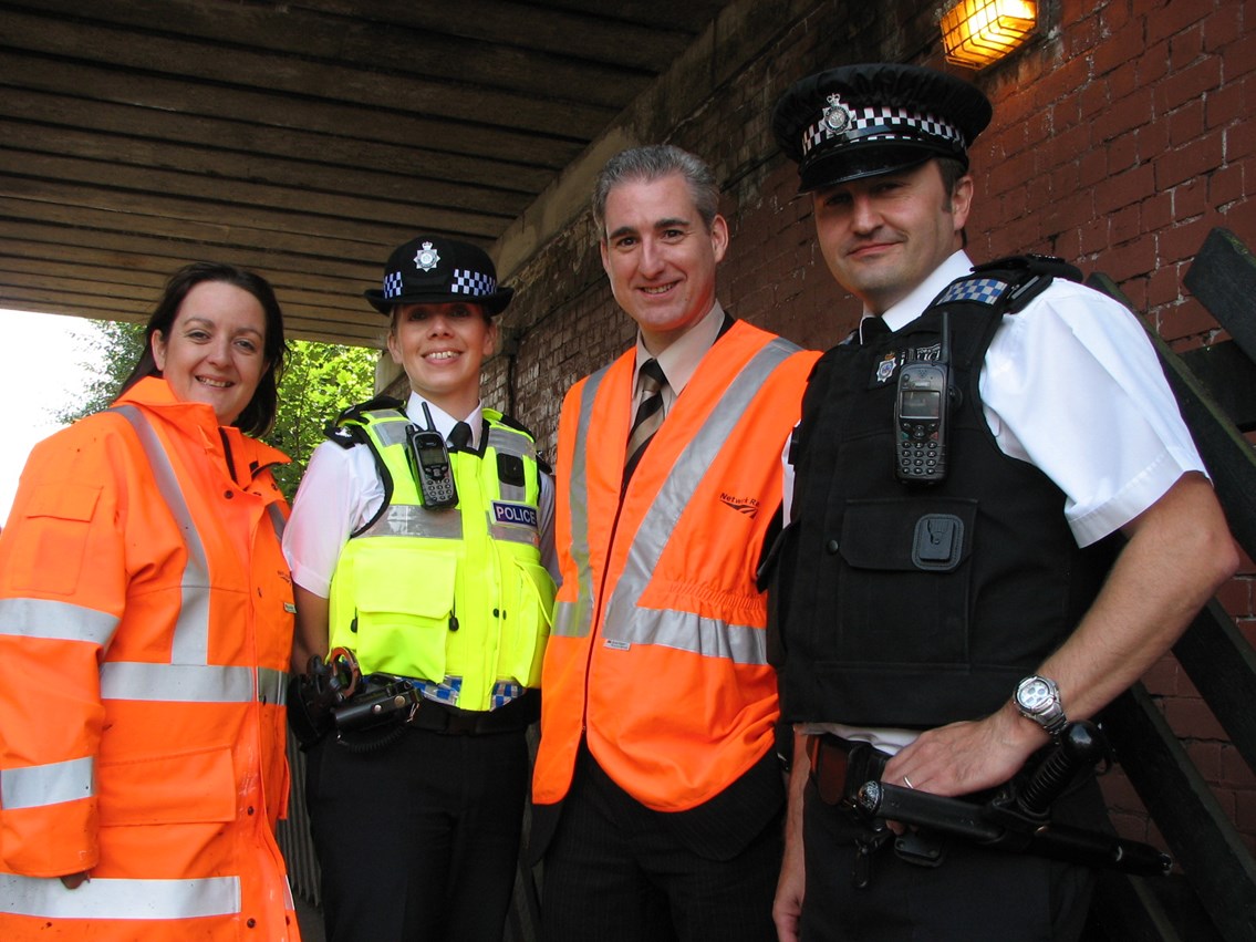 Community partnership at Burley Park station: Vicki Smith, Network Rail community safety manager, with Greg Mulholland MP and West Yorkshire police officers