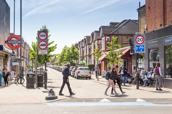 TfL launches new online data platform, creating a pioneering map of London that shows the link between deprivation and road casualties: TfL Image - Pedestrians cross the road outside Tooting Bec station