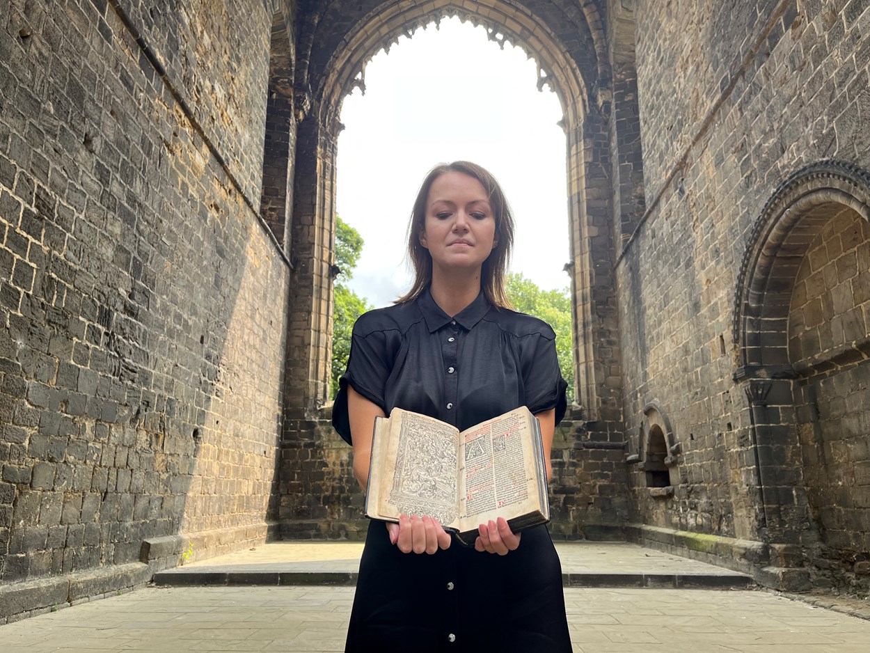 Kirkstall Missal: Senior librarian Rhian Isaac in Kirkstall Abbey with Leeds Central Library's precious copy of the Missale ad usum Cistercienci. Printed in Paris in 1516, the book is believed to have once belonged to the monks of Kirkstall Abbey and remarkably, it still contains notes and passages they delicately wrote by hand.