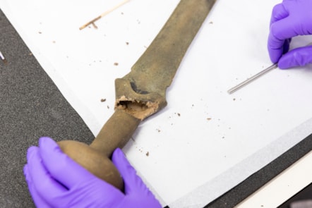 Conservator Bethan Bryan works on the Leadburn sword. Image © Duncan McGlynn (3)