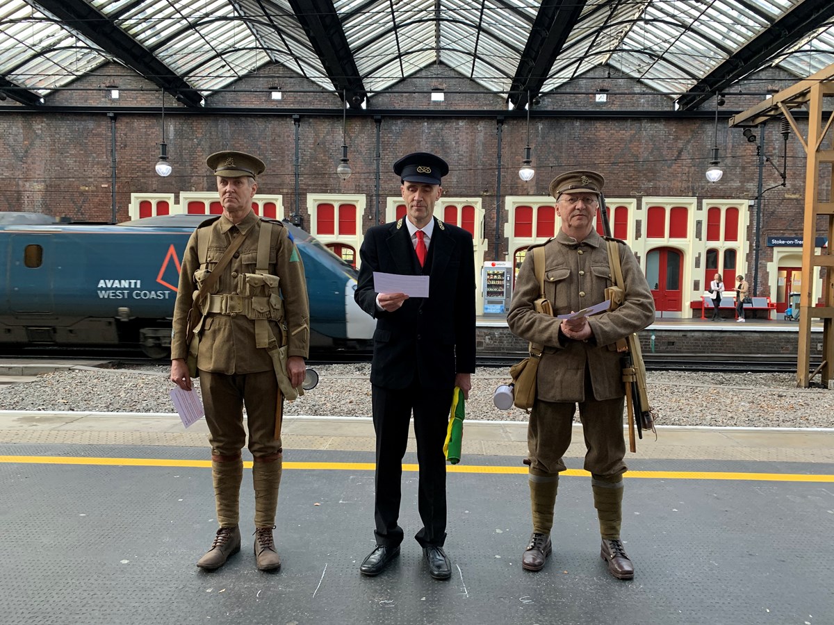 Volunteers dressed in period costumes as soldiers and a Station Master read out the names of the railway workers who are honoured on the Stoke Station War Memorial Arch