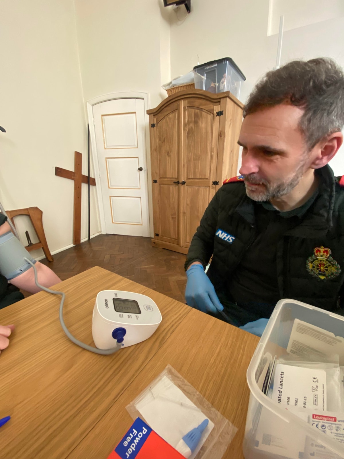 Paramedic Karl Charlton carrying out a Health MOT check