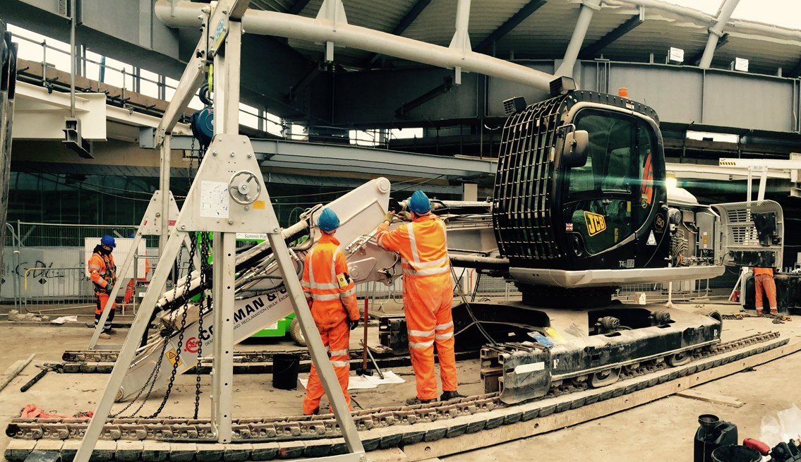 Dismantling the Mega-Muncher: Dismantling the bespoke JCB machine fondly known as the Mega-Muncher which crunched its way through the 6,000 tonnes of concrete from the area under the new atrium allowing the concourse to be flooded with natural light.