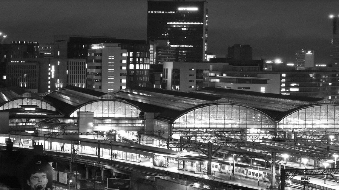Manchester Piccadilly night time aerial shot