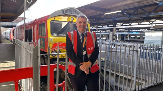 Phil Dominey standing by Inspiration train at Southampton Central: Phil Dominey, South Western Railway's Senior Regional Development Manager