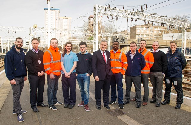 Network Rail celebrates 10 years of its Advanced Apprenticeship Scheme: Mark Carne and 10 apprentices from 10 years of the scheme